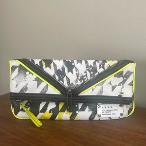 L.A.M.B. by Gwen Stefani Haughton acid houndstooth foldover signature clutch